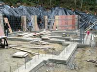 Rebar-reinforced concrete footers